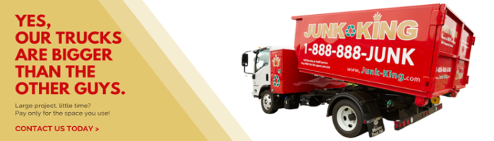 A red dump truck displays a phrase.
